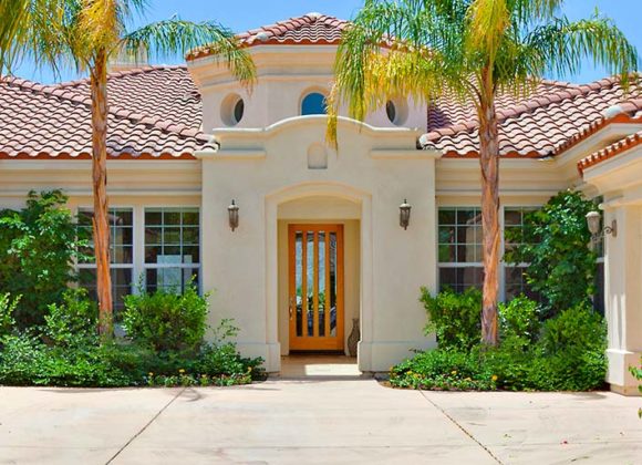 house front on a nice shiny day covered with Renters Insurance