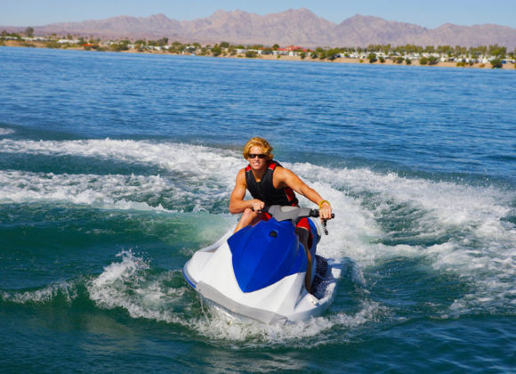 Woman on a jet ski enjoying the water with Boat Insurance in Palm Springs, Indio, Cathedral City, Thousand Palms, and Nearby Cities