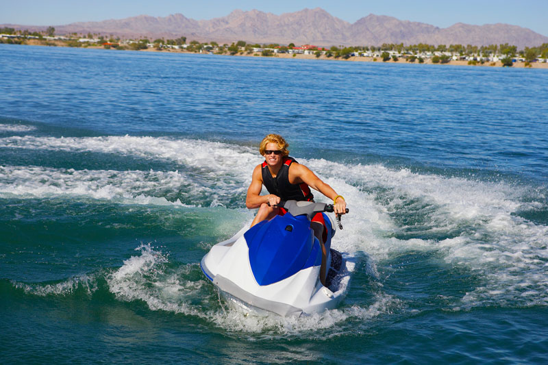 Woman on a jet ski enjoying the water with Boat Insurance in Palm Springs, Indio, Cathedral City, Thousand Palms, and Nearby Cities