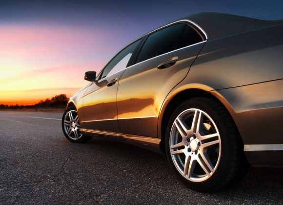 black car with a sunset driving with Automobile Insurance in Cathedral City, Thousand Palms, La Quinta, CA, and Surrounding Areas